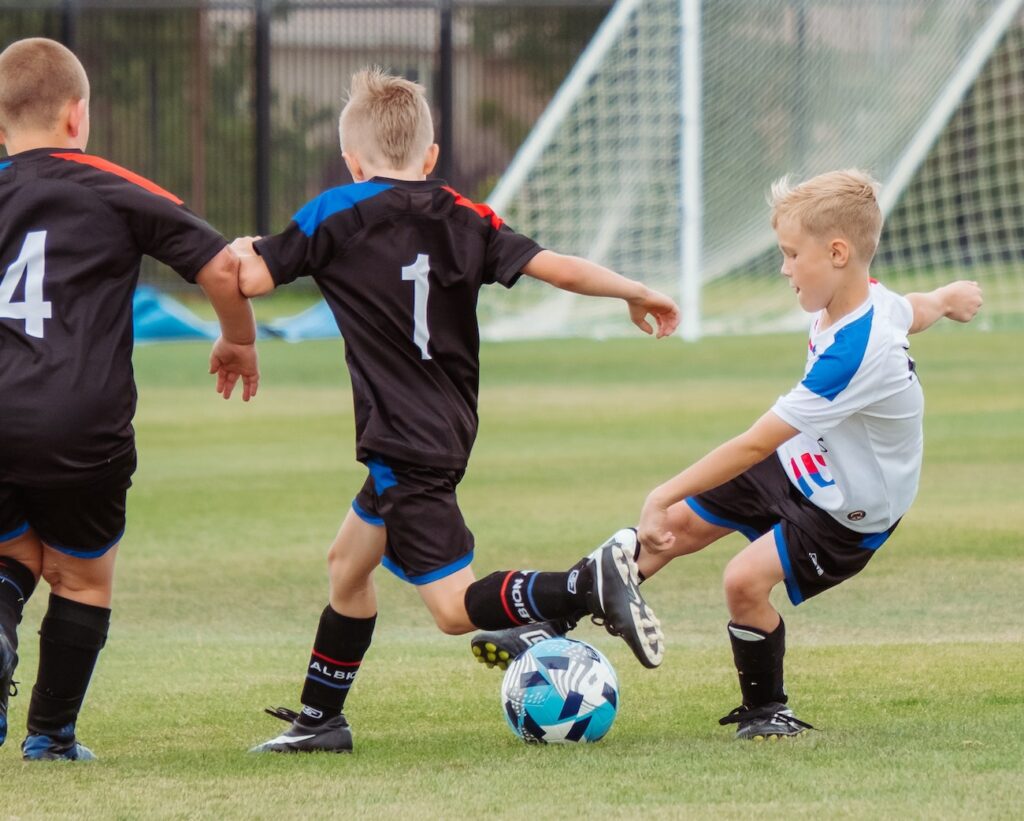 Children playing football | Primesave Properties