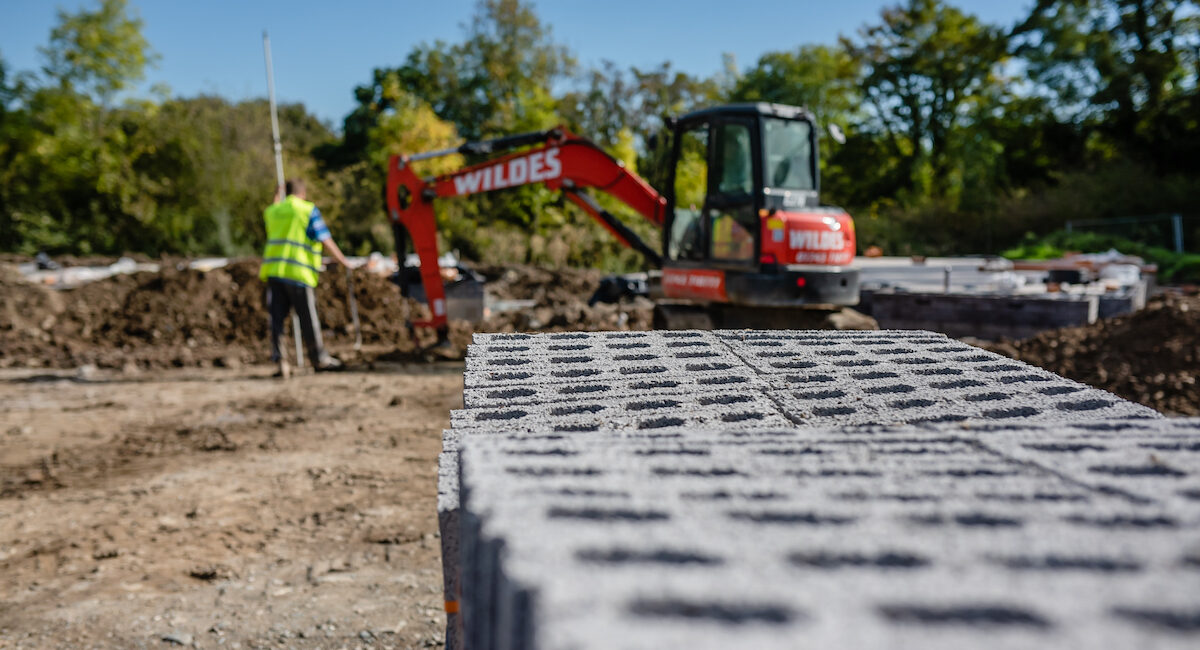 Digger and breeze blocks, construction | Primesave Properties